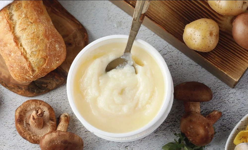 Golden duck fat in a small jar